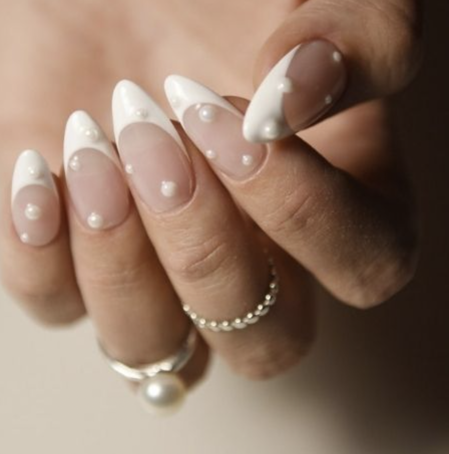 Let Hailey Bieber's Chrome Nails Inspire Your Wedding Mani